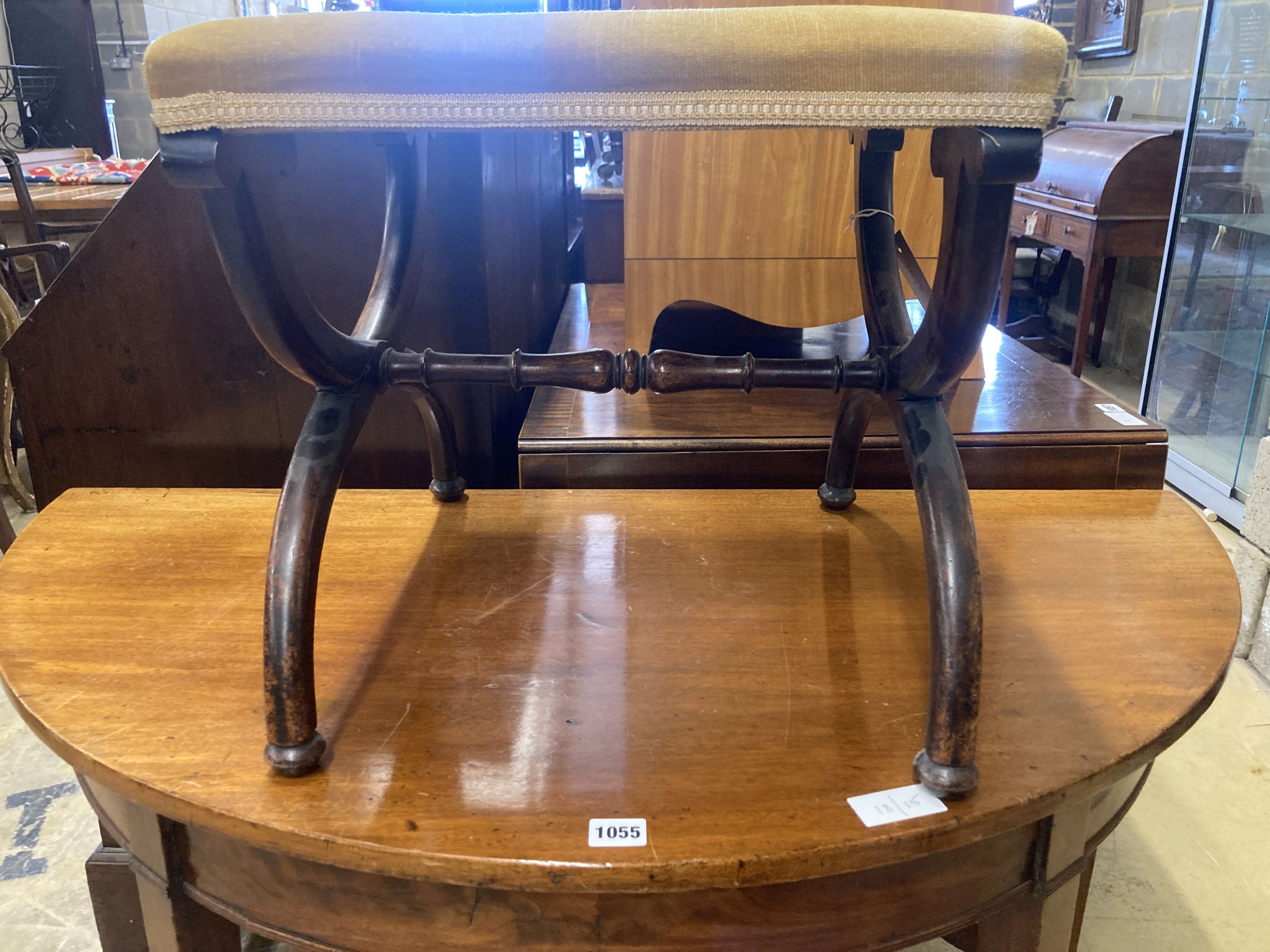 An early Victorian mahogany X frame dressing stool, length 45cm, depth 42cm, height 41cm
